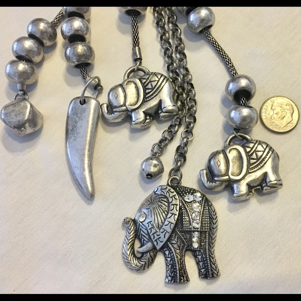 elephant necklace, silver bracelet and earrings
